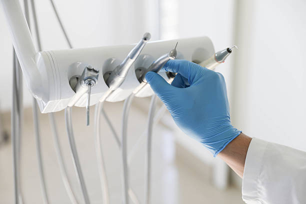Professional Tooth Extraction technician working in Tome, NM